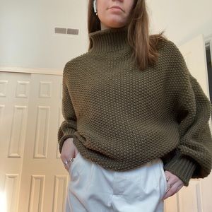 green slouchy turtleneck